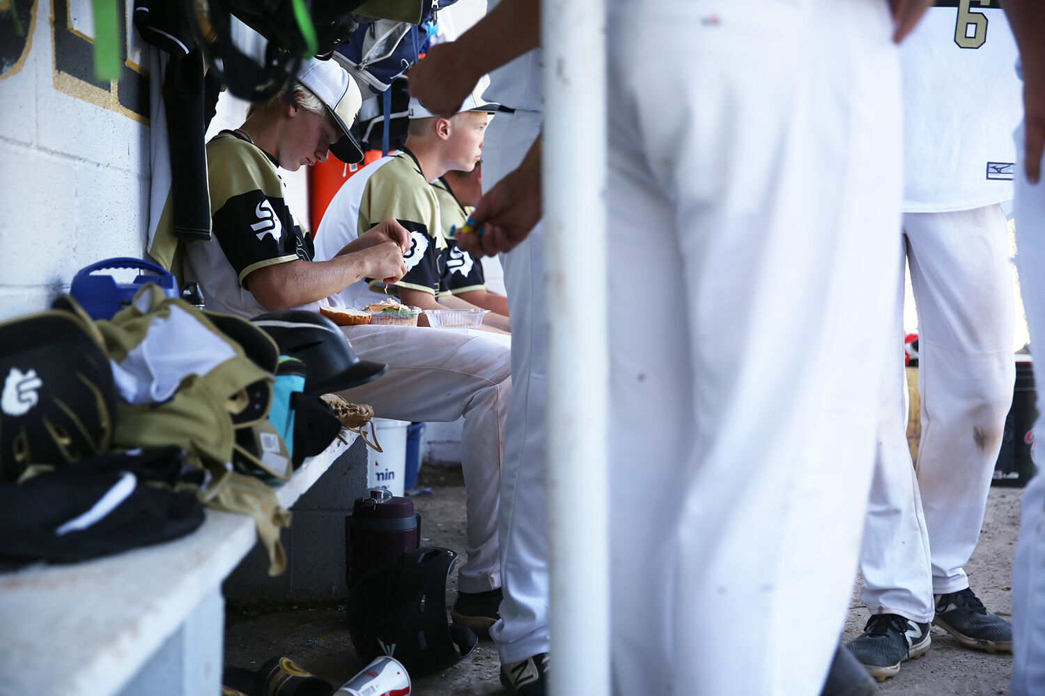 Bryce Camino adds mayo to his between games sandwich
